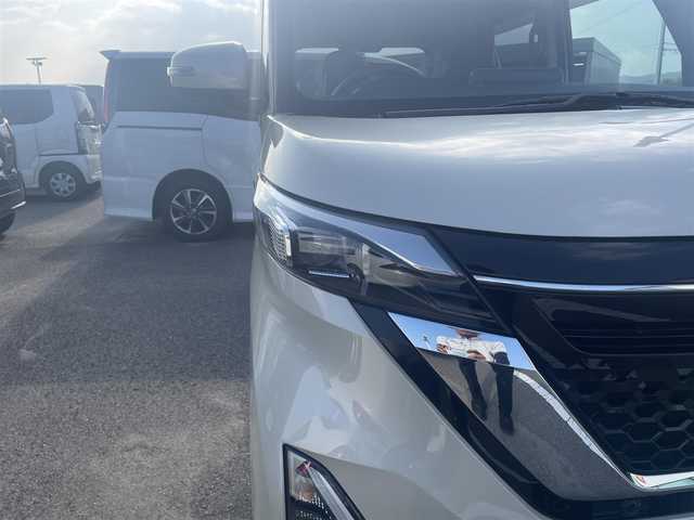 日産 ルークス HWS X プロパイロットED 和歌山県 2022(令4)年 1.7万km フローズンバニラパール 純正9インチナビ（MM321D-V）/フルセグTV/Bluetooth/CD/DVD/USB/全周囲カメラ/ビルトインETC/前後ドライブレコーダー/プロパイロット/衝突軽減カメラ/レーンキープアシスト/レーダークルーズコントロール/コーナーセンサー/両側パワースライドドア/ハンズフリーオートスライド/快適パックA/プラズマクラスター付きリヤシーリングファン/パーソナルテーブル/カップホルダー9個/助手席裏USBソケット/ロールサンシェード/撥水加工シート/電動パーキングブレーキ/オートブレーキホールド/LEDヘッドライト/フォグランプ/オートライト/オートハイビーム/純正14インチAW/ドアバイザー/プッシュスタート/スマートキー