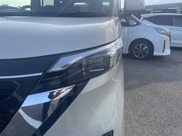 日産 ルークス HWS X プロパイロットED 和歌山県 2022(令4)年 1.7万km フローズンバニラパール 純正9インチナビ（MM321D-V）/フルセグTV/Bluetooth/CD/DVD/USB/全周囲カメラ/ビルトインETC/前後ドライブレコーダー/プロパイロット/衝突軽減カメラ/レーンキープアシスト/レーダークルーズコントロール/コーナーセンサー/両側パワースライドドア/ハンズフリーオートスライド/快適パックA/プラズマクラスター付きリヤシーリングファン/パーソナルテーブル/カップホルダー9個/助手席裏USBソケット/ロールサンシェード/撥水加工シート/電動パーキングブレーキ/オートブレーキホールド/LEDヘッドライト/フォグランプ/オートライト/オートハイビーム/純正14インチAW/ドアバイザー/プッシュスタート/スマートキー