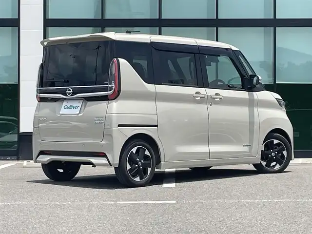 日産 ルークス HWS X プロパイロットED 和歌山県 2022(令4)年 1.7万km フローズンバニラパール 純正9インチナビ（MM321D-V）/フルセグTV/Bluetooth/CD/DVD/USB/全周囲カメラ/ビルトインETC/前後ドライブレコーダー/プロパイロット/衝突軽減カメラ/レーンキープアシスト/レーダークルーズコントロール/コーナーセンサー/両側パワースライドドア/ハンズフリーオートスライド/快適パックA/プラズマクラスター付きリヤシーリングファン/パーソナルテーブル/カップホルダー9個/助手席裏USBソケット/ロールサンシェード/撥水加工シート/電動パーキングブレーキ/オートブレーキホールド/LEDヘッドライト/フォグランプ/オートライト/オートハイビーム/純正14インチAW/ドアバイザー/プッシュスタート/スマートキー
