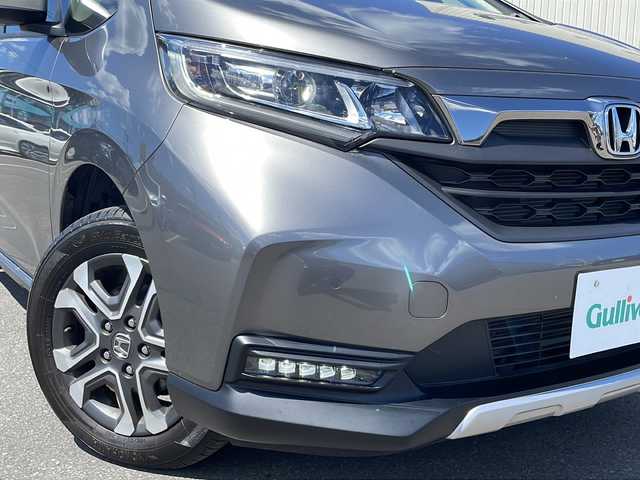 ホンダ フリード クロスター ホンダセンシング 道北・旭川 2020(令2)年 1.7万km スーパープラチナグレーメタリック /４ＷＤ//禁煙車//純正ナビ//ＣＤ/ＤＶＤ/フルセグ/ＢＴ//両側パワースライドドア//前席シートヒーター//ホンダセンシング/アダプティブ・クルーズ・コントロール/衝突軽減ブレーキ/誤発進抑制機能/歩行者事故低減ステアリング/路外逸脱抑制機能/車線維持支援システム/先行車発信お知らせ機能/標識認識機能//バックカメラ//ＬＥＤヘッドライト//オートライト//アダクティブコーナーリングランプ//ハーフレザーシート//ステアリングリモコン//フロントワイパーデアイサー//ドアミラーヒーター//保証書、取説//スペアキー×１