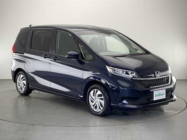 ホンダ フリード G ホンダセンシング 宮崎県 2022(令4)年 2.4万km ミッドナイトブルービームM 禁煙車/ホンダセンシング/純正ナビ/（Gathers/VXM-225Ci/CD/Bluetooth/FMAM)/純正バックカメラ/純正ビルトインETC/純正LEDオートライト/純正フロアマット/両側電動スライドドア/アダプティブクルーズコントロール/レーンディパーチャーアラート/クリアランスソナー/前席シートヒーター/オートエアコン（プラズマクラスター）/ウインカードアミラー/スマートキー/プッシュエンジンスタート/スペアキー/新車時保証書/取扱い説明書