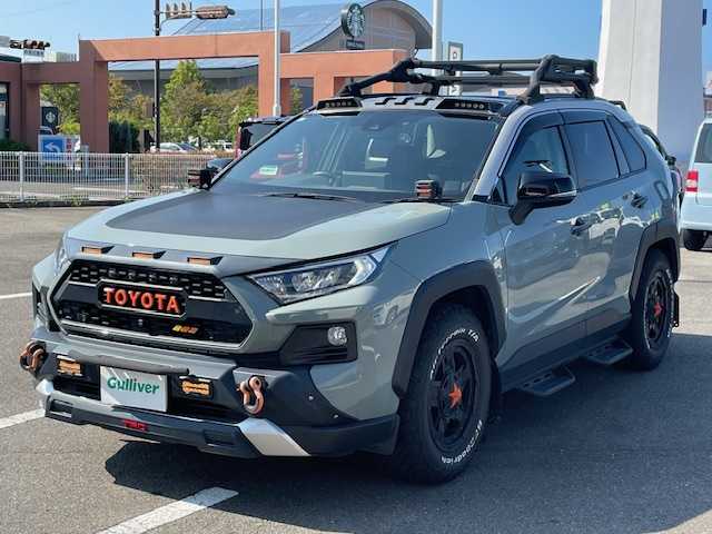 トヨタ ＲＡＶ４ アドベンチャー 長崎県 2020(令2)年 4.8万km アッシュグレーメタリック/アーバンカーキ 純正ディスプレイオーディオ/BT/USB/Mira cast/全方位カメラ/サンルーフ/合皮レザーシート/D席パワーシート/D/N席シートヒーター・エアーシート/トヨタセーフティセンス/レーダークルーズコントロール/ステアリングヒーター/パワーバックドア/ドライブレコーダー前後/LEDヘッドライト/オートマチックハイビーム/ビルトインETC/ボンネットラッピング/ルーフキャリアー/リアラダー/フロントロアーガーニッシュ/IPFキューブライト/ルーフマーカー（ライト）/グリルマーカー/牽引フック/サイドステップ（ナーフステップ）/TRDエアロ前後/TRDマッドフラップ/TRDドアハンドルプロテクター