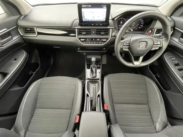 ホンダ ＷＲ－Ｖ Z+ 福井県 2024(令6)年 0.8万km プラチナホワイトパール 純正8型ナビ/(FM/AM/フルセグTV/Bluetooth）/バックカメラ/Honda SENSING/-CMBS　衝突軽減ブレーキ/-ACC　アダプティブクルーズ/-LKAS　車線維持支援システム/-前後パーキングセンサーシステム/-路外逸脱抑制機能/-標識認識機能/-オートハイビーム機能/-先行車発進お知らせ機能/ルーフレール/ハーフレザーシート/オートエアコン/オートライト/LED ヘッドライト＋フロントフォグライト/パドルシフト
