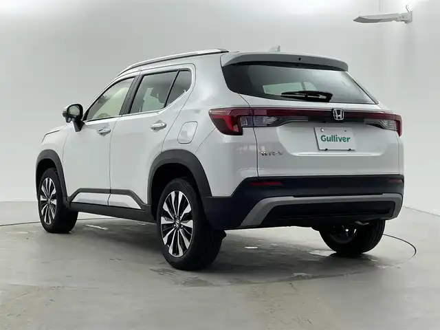 ホンダ ＷＲ－Ｖ Z+ 福井県 2024(令6)年 0.8万km プラチナホワイトパール 純正8型ナビ/(FM/AM/フルセグTV/Bluetooth）/バックカメラ/Honda SENSING/-CMBS　衝突軽減ブレーキ/-ACC　アダプティブクルーズ/-LKAS　車線維持支援システム/-前後パーキングセンサーシステム/-路外逸脱抑制機能/-標識認識機能/-オートハイビーム機能/-先行車発進お知らせ機能/ルーフレール/ハーフレザーシート/オートエアコン/オートライト/LED ヘッドライト＋フロントフォグライト/パドルシフト