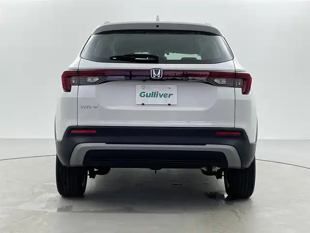 ホンダ ＷＲ－Ｖ Z+ 福井県 2024(令6)年 0.8万km プラチナホワイトパール 純正8型ナビ/(FM/AM/フルセグTV/Bluetooth）/バックカメラ/Honda SENSING/-CMBS　衝突軽減ブレーキ/-ACC　アダプティブクルーズ/-LKAS　車線維持支援システム/-前後パーキングセンサーシステム/-路外逸脱抑制機能/-標識認識機能/-オートハイビーム機能/-先行車発進お知らせ機能/ルーフレール/ハーフレザーシート/オートエアコン/オートライト/LED ヘッドライト＋フロントフォグライト/パドルシフト