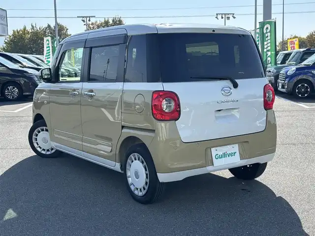 ダイハツ ムーヴ キャンバス ストライプス G 奈良県 2022(令4)年 2.3万km シャイニングホワイトパール/サンドベージュメタリック 純正ナビ（NMZN-W727)/（フルセグ/BT/CD/DVD)/アラウンドビューモニター/前後コーナーセンサー/衝突軽減システム/レーンキープアシスト/両側パワースライドドア/前席シートヒーター/LEDヘッドライト/前方ドライブレコーダー/ETC/純正ホイールキャップ/保証書/取り扱い説明書/スペアキーX1