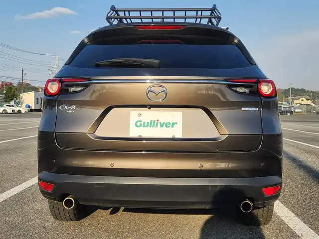 マツダ ＣＸ－８ XD プロアクティブ 秋田県 2021(令3)年 9.9万km チタニウムフラッシュマイカ 4WD/MOP10.25型ナビ/フルセグTV/アルパイン後席用フリップダウンモニター/ハンズフリーパワーバックドア/360度ビューモニター/ETC/レーダークルーズコントロール/前後パーキングセンサー/衝突被害軽減ブレーキ/車線逸脱防止支援システム/交通標識認識システム/ブラインドスポットモニタリング/ヘッドアップディスプレイ/アダプティブLEDヘッドランプ/デュアルオートエアコン/革巻きステアリング/前席/2列目シートヒーター/前席パワーシート/運転席シートメモリー/2列目キャプテンシート/社外17インチAWスタッドレス/純正AW積込み/スマートキー/プッシュエンジンスタート/禁煙車