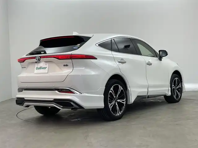 トヨタ ハリアー ハイブリッド Z レザーパッケージ 埼玉県 2020(令2)年 2.2万km ホワイトパールクリスタルシャイン モデリスタエアロ/モデリスタ２０インチアルミホイール/JBLサウンド/トヨタセーフティーセンス/プリクラッシュセーフティ/レーンディパーチャーアラート/レーダークルーズコントロール/ロードサイドアシスト/オートマチックハイビーム/ブラインドスポットモニター/インテリジェントクリアランスソナー/純正ディスプレイオーディオ12.3インチ/地デジTV Bluetooth USB/ヘットアップディスプレイ/デジタルインナーミラー/パノラミックビューモニター/レザーシート/シートヒーター/ベンチレーション/前席パワーシート/ステアリングヒーター/運転席シートメモリー/パワーバックドア/社外ドライブレコーダー前後/ビルトインETC2.0/LEDオートライト