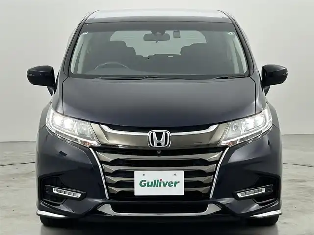 ホンダ オデッセイ ハイブリッド アブソルート・EXホンダセンジング 福岡県 2019(平31)年 4.3万km プレミアムヴィーナスブラックP 後席モニター　/純正９型ナビ（ＢＴ，フルセグＴＶ）　/全方位カメラ　/ＥＴＣ　/前後ドラレコ　/ＡＣＣ　/コーナーセンサー　/衝突軽減ブレーキ　/レーンキープ　/パーキングアシスト　/両側電動スライドドア　/ハーフレザー