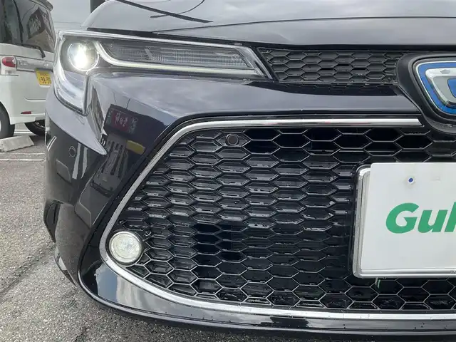 トヨタ カローラツーリング ハイブリッド ダブルバイビー 滋賀県 2020(令2)年 3.7万km スパークリングブラックパールクリスタルシャイン ワンオーナー/純正8インチディスプレイオーディオ/・Bluetooth・バックモニター/トヨタセーフティーセンス/・プリクラッシュセーフティー・レーントレーシングアシスト/・レーダークルーズコントロール・ロードアシストサイン/・オートマチックハイビーム/ハーフレザーシート/LEDヘッドライト/デイライト/オプティロンメーター7インチカラーマルチインフォメーションディスプレイ/シートヒーター/ステアリングヒーター/革巻きステアリング/オートライト/取説・保証書・スペアキー/