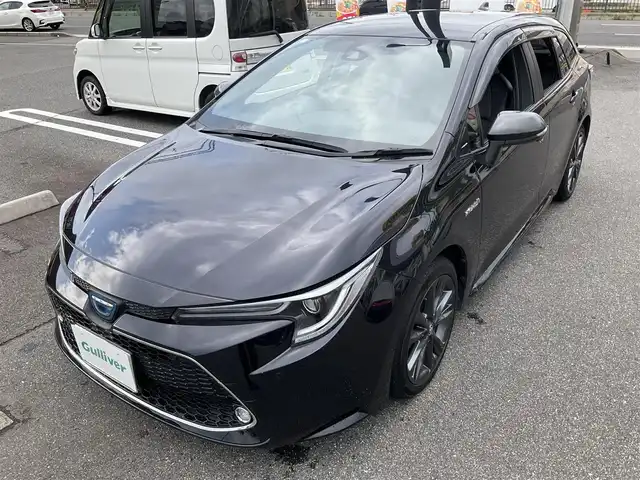 トヨタ カローラツーリング ハイブリッド ダブルバイビー 滋賀県 2020(令2)年 3.7万km スパークリングブラックパールクリスタルシャイン ワンオーナー/純正8インチディスプレイオーディオ/・Bluetooth・バックモニター/トヨタセーフティーセンス/・プリクラッシュセーフティー・レーントレーシングアシスト/・レーダークルーズコントロール・ロードアシストサイン/・オートマチックハイビーム/ハーフレザーシート/LEDヘッドライト/デイライト/オプティロンメーター7インチカラーマルチインフォメーションディスプレイ/シートヒーター/ステアリングヒーター/革巻きステアリング/オートライト/取説・保証書・スペアキー/