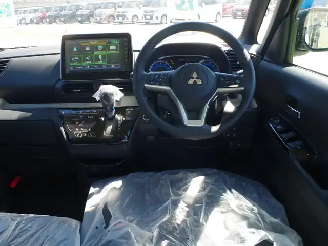 三菱 デリカミニ T プレミアム 千葉県 2025(令7)年 0.1千km アイボリーⅡ T　PREMIUM　9型ディスプレイオーディオ（121/330）CHAMONIXパッケージ（179190）/e-Assist/・衝突被害軽減ブレーキシステム（FCM）/・誤発進抑制機能（前進＆後退時）（UMS）/・車線逸脱警報システム（LDW）/・レーダークルーズコントロールシステム（ACC）/・オートマチックハイビーム[AHB]/マイパイロット/ハンズフリー両側パワースライドドア/ディスプレイオーディオ/【Bluetooth接続】/【Apple CarPlay　Android Auto対応】/マルチアラウンドモニター/デジタルインナーミラー/ハーフレザーシート/前席シートヒーター/ステアリングスイッチ/ステアリングヒーター/革巻きステアリング/パドルシフト/LEDヘッドライト/フォグライト/ウインカーミラー/コーナーセンサー/純正15インチアルミホイル/サイド/カーテンエアバッグ/キーレスオペレーションシステム