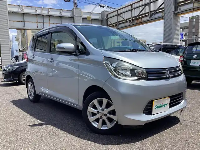 三菱 ｅＫワゴン G e－アシスト 鹿児島県 2015(平27)年 17.6万km クールシルバーメタリック 純正14インチアルミホイール/クラリオンワイド6.8型VGA地上デジタルTV/DVD/SD /   AVライトナビゲーション/バックカメラ/プッシュスタート/アイドリングストップ/オートエアコン