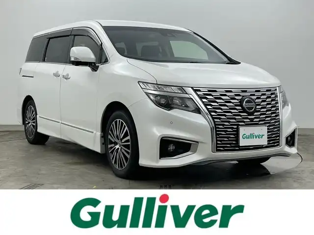 日産 エルグランド 250ハイウェイスターS 岡山県 2021(令3)年 7.9万km ピュアホワイトパール 純正10インチナビ/地デジ/Bluetooth/CD/DVD/Blu-ray/純正フリップダウンモニター/アラウンドビューモニター/両側パワースライドドア/エマージェンシーブレーキ/レーンキープアシスト/ブラインドスポットモニター/レーダークルーズコントロール/両側パワースライドドア/ビルトインETC/純正ドライブレコーダー /LEDヘッドライト/オートハイビーム /ハーフレザーシート /プッシュスタート /スマートキー /新車保証書/取扱説明書/スペアキー×１
