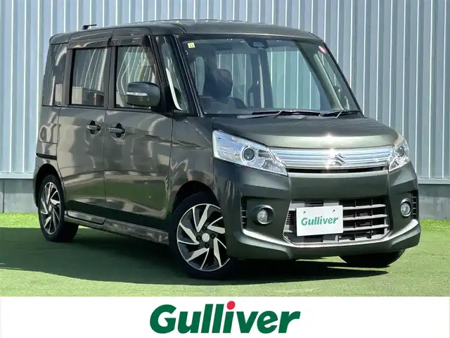 スズキ スペーシア カスタム TS 香川県 2014(平26)年 5.4万km クールカーキPM 登録時走行距離：53123km/Pioneer7インチナビ/→ＣＤ／ＤＶＤ/→Bluetooth/バックカメラ/レーダーブレーキサポート/両側パワースライドドア/革巻きステアリング/パワーステアリング/パワーウィンドウ/純正15インチAW/ETC/オートライト/フォグライト/プッシュスタート/スマートキー