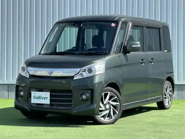 スズキ スペーシア カスタム TS 香川県 2014(平26)年 5.4万km クールカーキPM 登録時走行距離：53123km/Pioneer7インチナビ/→ＣＤ／ＤＶＤ/→Bluetooth/バックカメラ/レーダーブレーキサポート/両側パワースライドドア/革巻きステアリング/パワーステアリング/パワーウィンドウ/純正15インチAW/ETC/オートライト/フォグライト/プッシュスタート/スマートキー