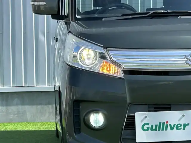 スズキ スペーシア カスタム TS 香川県 2014(平26)年 5.4万km クールカーキPM 登録時走行距離：53123km/Pioneer7インチナビ/→ＣＤ／ＤＶＤ/→Bluetooth/バックカメラ/レーダーブレーキサポート/両側パワースライドドア/革巻きステアリング/パワーステアリング/パワーウィンドウ/純正15インチAW/ETC/オートライト/フォグライト/プッシュスタート/スマートキー