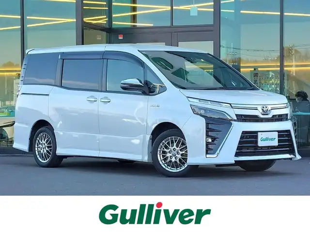 トヨタ ヴォクシー ハイブリッド ZS 煌Ⅱ 東京都 2020(令2)年 5.2万km ホワイトパールクリスタルシャイン セーフティセンス/・プリクラッシュセーフティ/・レーンキープアシスト/・オートハイビーム/・クリアランスソナー/Kenwood9インチナビ/バックカメラ/CD/DVD/BT/AM/FM/TV/両側パワースライドドア/LEDヘッドライト/フォグ/シートヒーター/USBポート/ビルトインETC
