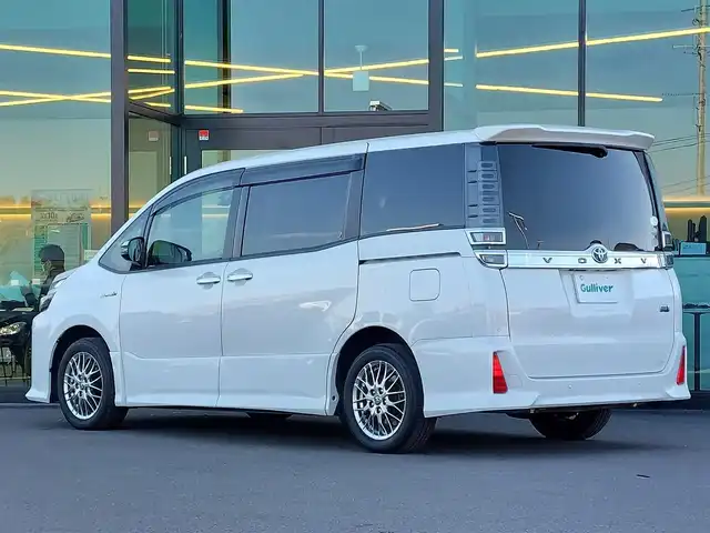 トヨタ ヴォクシー ハイブリッド ZS 煌Ⅱ 東京都 2020(令2)年 5.2万km ホワイトパールクリスタルシャイン セーフティセンス/・プリクラッシュセーフティ/・レーンキープアシスト/・オートハイビーム/・クリアランスソナー/Kenwood9インチナビ/バックカメラ/CD/DVD/BT/AM/FM/TV/両側パワースライドドア/LEDヘッドライト/フォグ/シートヒーター/USBポート/ビルトインETC