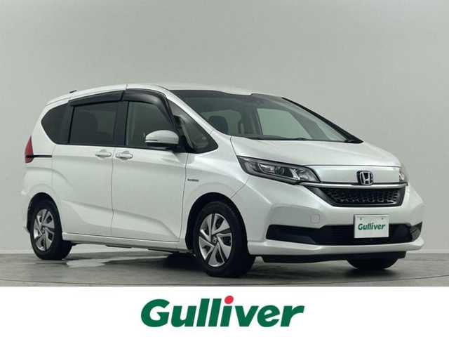 ホンダ フリード ハイブリット G ホンダセンシング 埼玉県 2020(令2)年 0.7万km プラチナホワイトパール 純正ナビ　Ｂｌｕｅｔｏｏｔｈ　バックカメラ　前後ドライブレコーダー　クルーズコントロール　レーンキープアシスト　両側パワースライドドア　シートヒーター　ステアリングスイッチ　ＥＴＣ　オートライト
