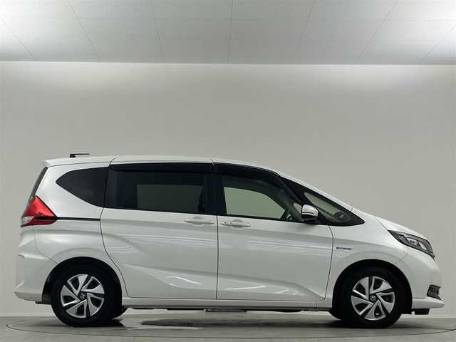 ホンダ フリード ハイブリット G ホンダセンシング 埼玉県 2020(令2)年 0.7万km プラチナホワイトパール 純正ナビ　Ｂｌｕｅｔｏｏｔｈ　バックカメラ　前後ドライブレコーダー　クルーズコントロール　レーンキープアシスト　両側パワースライドドア　シートヒーター　ステアリングスイッチ　ＥＴＣ　オートライト