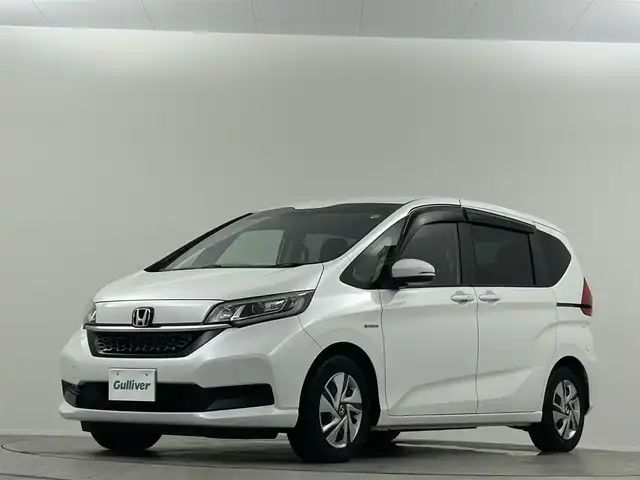 ホンダ フリード ハイブリット G ホンダセンシング 埼玉県 2020(令2)年 0.7万km プラチナホワイトパール 純正ナビ　Ｂｌｕｅｔｏｏｔｈ　バックカメラ　前後ドライブレコーダー　クルーズコントロール　レーンキープアシスト　両側パワースライドドア　シートヒーター　ステアリングスイッチ　ＥＴＣ　オートライト