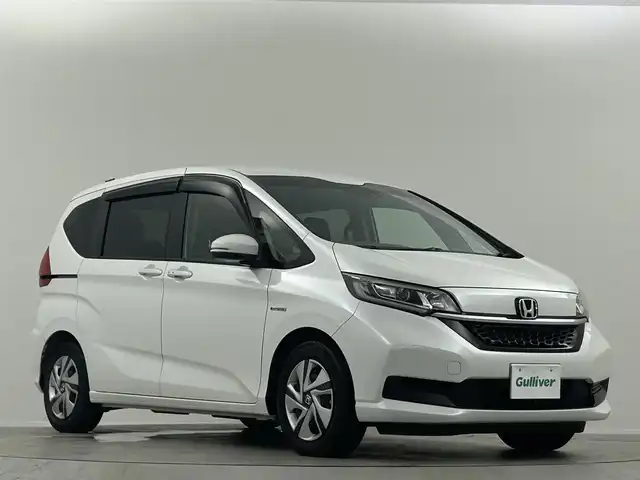 ホンダ フリード ハイブリット G ホンダセンシング 埼玉県 2020(令2)年 0.7万km プラチナホワイトパール 純正ナビ　Ｂｌｕｅｔｏｏｔｈ　バックカメラ　前後ドライブレコーダー　クルーズコントロール　レーンキープアシスト　両側パワースライドドア　シートヒーター　ステアリングスイッチ　ＥＴＣ　オートライト