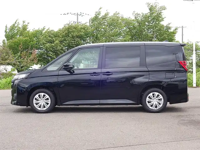 トヨタ ノア ハイブリッド X 山形県 2025(令7)年 0.1万km アティチュードブラックマイカ プリクラッシュセーフティ/両側パワースライドドア/レーダークルーズコントロール/LEDオートヘッドライト/コーナーセンサー/アイドリングストップ/ステアリングスイッチ/電動格納ウィンカーミラー/WAC/スマートキー