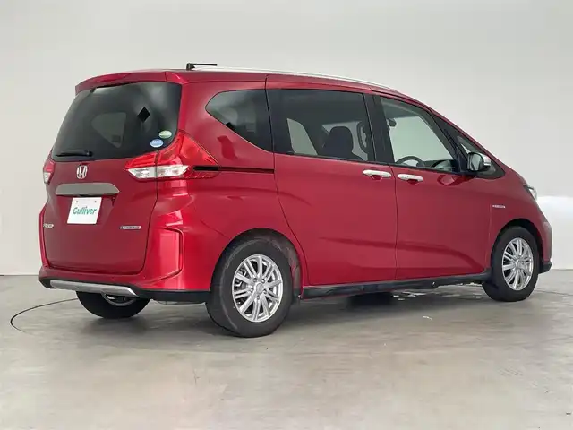 ホンダ フリード ハイブリット クロスター ホンダセンシング 埼玉県 2020(令2)年 3.8万km プレミアムクリスタルレッドM ￥純正9インチナビ・LEDライト・フリップダウンモニター・ETC・エンジンスターター・レーダークルーズコントロール・追従走行機能・HDMI・USB・AAC・スタッドレスタイヤ・3列シート・ドライブレコーダー・衝突被害支援システム・両側パワースライドドア・フルセグテレビ・バックカメラ・/プッシュスタート