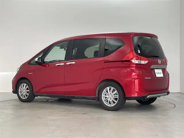 ホンダ フリード ハイブリット クロスター ホンダセンシング 埼玉県 2020(令2)年 3.8万km プレミアムクリスタルレッドM ￥純正9インチナビ・LEDライト・フリップダウンモニター・ETC・エンジンスターター・レーダークルーズコントロール・追従走行機能・HDMI・USB・AAC・スタッドレスタイヤ・3列シート・ドライブレコーダー・衝突被害支援システム・両側パワースライドドア・フルセグテレビ・バックカメラ・/プッシュスタート
