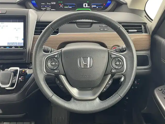 ホンダ フリード ハイブリット クロスター ホンダセンシング 埼玉県 2020(令2)年 3.8万km プレミアムクリスタルレッドM ￥純正9インチナビ・LEDライト・フリップダウンモニター・ETC・エンジンスターター・レーダークルーズコントロール・追従走行機能・HDMI・USB・AAC・スタッドレスタイヤ・3列シート・ドライブレコーダー・衝突被害支援システム・両側パワースライドドア・フルセグテレビ・バックカメラ・/プッシュスタート