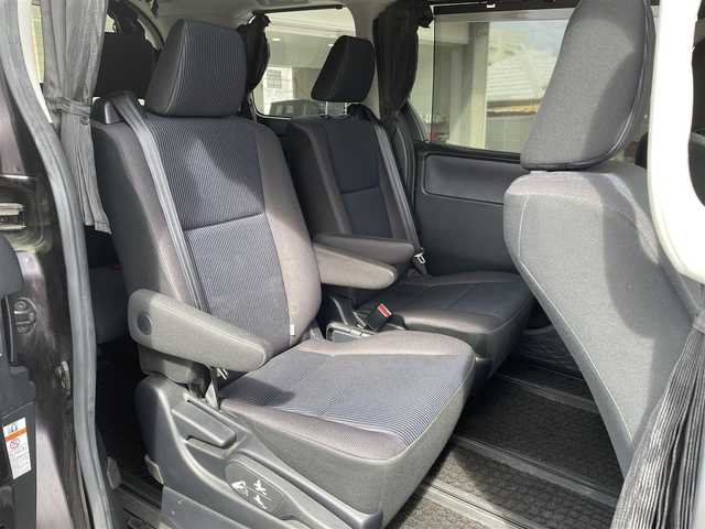 トヨタ ノア X 沖縄県 2014(平26)年 7.8万km ボルドーマイカメタリック (株)IDOMが運営する【じしゃロンコザ店】の自社ローン専用車両になりますこちらは現金またはオートローンご利用時の価格です。自社ローンご希望の方は別途その旨お申付け下さい/本土仕入れ　/純正ナビ　/フルセグＴＶ　/Ｂｌｕｅｔｏｏｔｈ接続　/ＥＴＣ　/両側パワースライドドア　/アイドリングストップ　/オートライト　/純正フロアマット　/モデリスタアルミホイール