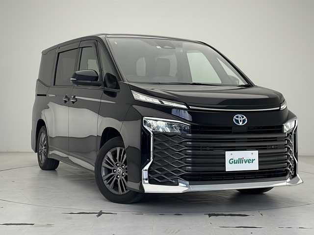 トヨタ ヴォクシー ハイブリッド S－G 沖縄県 2022(令4)年 5.9万km アティチュードブラックマイカ 純正１０．５型ディスプレイオーディオ/　(フルセグTV　Bluetooth)/バックカメラ/ETC2.0/ドライブレコーダー/トヨタセーフティセンス/・衝突被害軽減ブレーキ (プリクラッシュセーフティ)																									/・ハンドル操作サポート (レーントレーシングアシスト)																									/・追従ドライブ支援機能 (レーダークルーズコントロール)																									/・車線はみ出しアラート (レーンディパーチャーアラート)																									/・自動ハイビーム (オートマチックハイビーム)																									/パワースライドドア/プッシュスタート/スマートキー/クリアランスソナー/純正フロアマット/純正16インチアルミホイール/LEDヘッドライト/オートライト