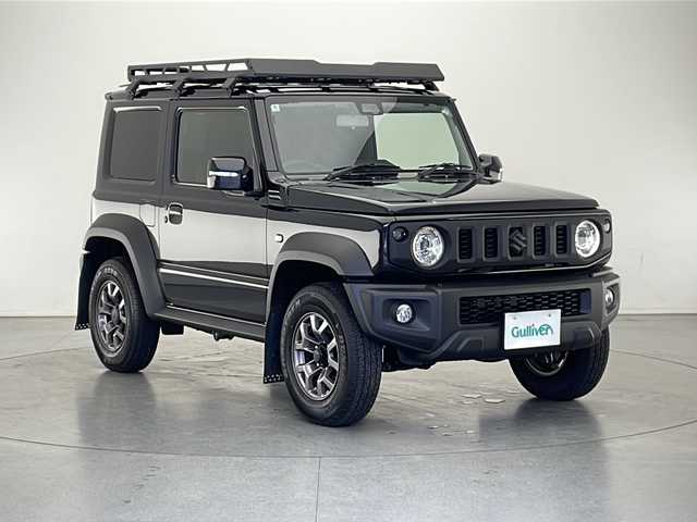 スズキ ジムニー シエラ JC 長野県 2024(令6)年 0.5万km ブルーイッシュブラックパール3 4WD/社外メモリナビ&フルセグTV&CD&DVD&BT/クルーズコントロール/車線逸脱警報/衝突軽減ブレーキ/後方コーナーセンサー/アイドリングストップ/前席シートヒーター/ステアリングスイッチ/ビルトインETC/LEDヘッドライト/オートライト/オートマチックハイビーム/フロントフォグランプ/電動格納ミラー/ウィンカーミラー/ドアミラーヒーター/純正15インチAW装着/社外フロアマット/社外ルーフキャリア/背面タイヤ/プッシュスタート/スマートキー