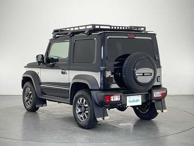 スズキ ジムニー シエラ JC 長野県 2024(令6)年 0.5万km ブルーイッシュブラックパール3 4WD/社外メモリナビ&フルセグTV&CD&DVD&BT/クルーズコントロール/車線逸脱警報/衝突軽減ブレーキ/後方コーナーセンサー/アイドリングストップ/前席シートヒーター/ステアリングスイッチ/ビルトインETC/LEDヘッドライト/オートライト/オートマチックハイビーム/フロントフォグランプ/電動格納ミラー/ウィンカーミラー/ドアミラーヒーター/純正15インチAW装着/社外フロアマット/社外ルーフキャリア/背面タイヤ/プッシュスタート/スマートキー