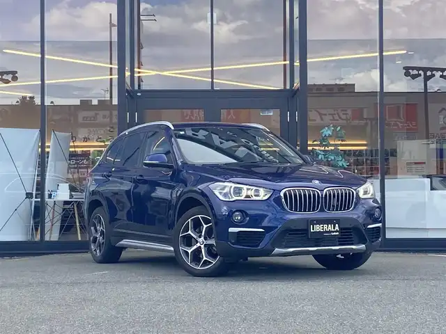 ＢＭＷ Ｘ１ xDrive 18d xライン 福岡県 2018(平30)年 2万km 青 ・純正HDDナビ/USB/Bluetooth/CD/DVD/・バックカメラ/・ハーフレザーシート/シートヒーター/・ドライブレコーダー/・ETC/・純正18AW/・プッシュスタート/・パーキングアシスト/・アイドリングストップ/・スマートキー/・スペアキー/・オートライト/・LEDライト/・保証書/・取扱説明書