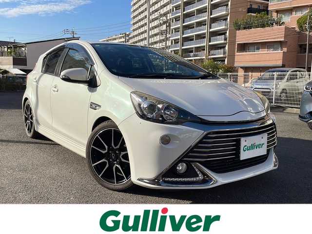 トヨタ アクア G G’s 宮崎県 2014(平26)年 9.2万km ライムホワイトパールクリスタルシャイン 純正ＳＤナビ(NSZT-W62G)/(BT/DTV/CD/DVD/AM/FM)/バックカメラ　/オートライト　/純正ＥＴＣ　/純正アルミホイール　/純正フロアマット　/電動格納ミラー　/ハーフレザーシート　/プッシュボタン　/スマートキー