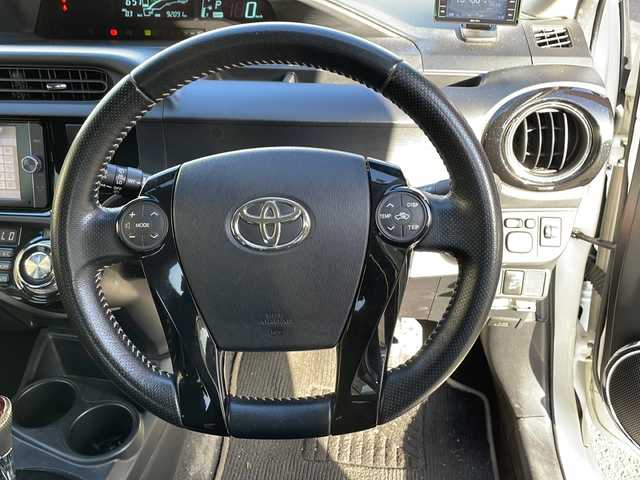 トヨタ アクア G G’s 宮崎県 2014(平26)年 9.2万km ライムホワイトパールクリスタルシャイン 純正ＳＤナビ(NSZT-W62G)/(BT/DTV/CD/DVD/AM/FM)/バックカメラ　/オートライト　/純正ＥＴＣ　/純正アルミホイール　/純正フロアマット　/電動格納ミラー　/ハーフレザーシート　/プッシュボタン　/スマートキー