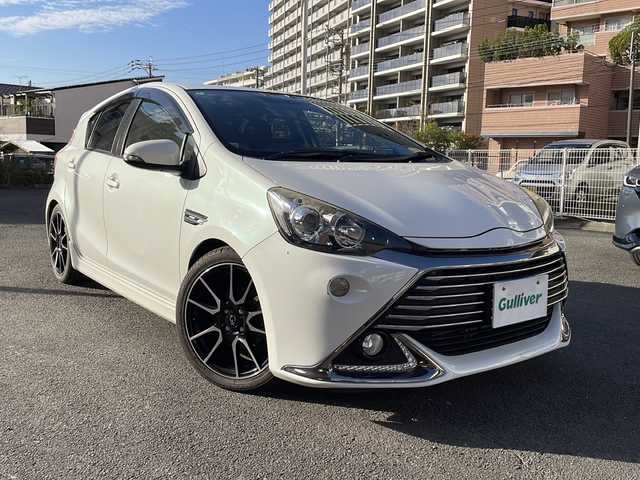 トヨタ アクア G G’s 宮崎県 2014(平26)年 9.2万km ライムホワイトパールクリスタルシャイン 純正ＳＤナビ(NSZT-W62G)/(BT/DTV/CD/DVD/AM/FM)/バックカメラ　/オートライト　/純正ＥＴＣ　/純正アルミホイール　/純正フロアマット　/電動格納ミラー　/ハーフレザーシート　/プッシュボタン　/スマートキー