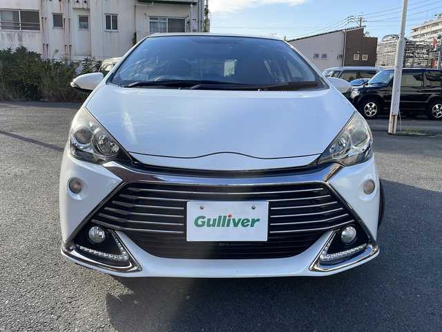 トヨタ アクア G G’s 宮崎県 2014(平26)年 9.2万km ライムホワイトパールクリスタルシャイン 純正ＳＤナビ(NSZT-W62G)/(BT/DTV/CD/DVD/AM/FM)/バックカメラ　/オートライト　/純正ＥＴＣ　/純正アルミホイール　/純正フロアマット　/電動格納ミラー　/ハーフレザーシート　/プッシュボタン　/スマートキー