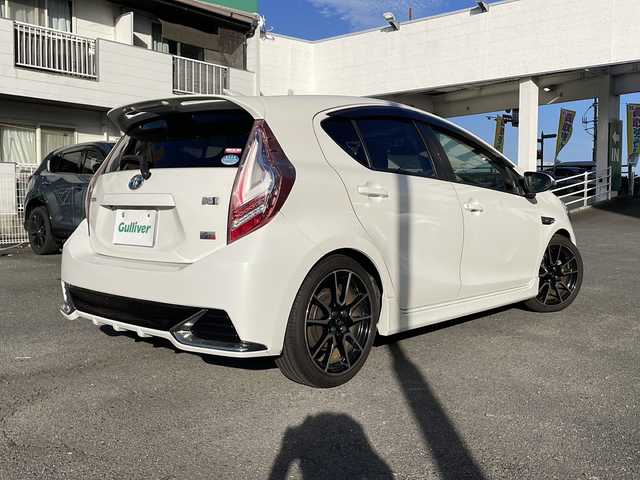 トヨタ アクア G G’s 宮崎県 2014(平26)年 9.2万km ライムホワイトパールクリスタルシャイン 純正ＳＤナビ(NSZT-W62G)/(BT/DTV/CD/DVD/AM/FM)/バックカメラ　/オートライト　/純正ＥＴＣ　/純正アルミホイール　/純正フロアマット　/電動格納ミラー　/ハーフレザーシート　/プッシュボタン　/スマートキー