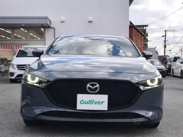 マツダ マツダ３ファストバック XD プロアクティブ ツーリングS 熊本県 2019(令1)年 9.8万km ポリメタルグレーM 純正ナビ/【フルセグTV/Bluetooth/CD/DVD】/バックカメラ/レーダークルーズコントロール/スマートブレーキサポート/ドライバーアテンションアラート/車線逸脱警報システム/レーンキープアシストシステム/ディスタンス＆スピードアラート/ブラインドスポットモニタリング/コーナーセンサー/ロードサインアシスト/ブレーキホールド/D席パワーシート/前席シートヒーター/オートLEDライト/オートハイビーム/社外18インチAW/革巻きステアリング/ステアリングスイッチ/ステアリングヒーター/ウィンカーミラー/アイドリングストップ/純正フロアマット/横滑り防止装置/保証書/取扱説明書/スペアキー