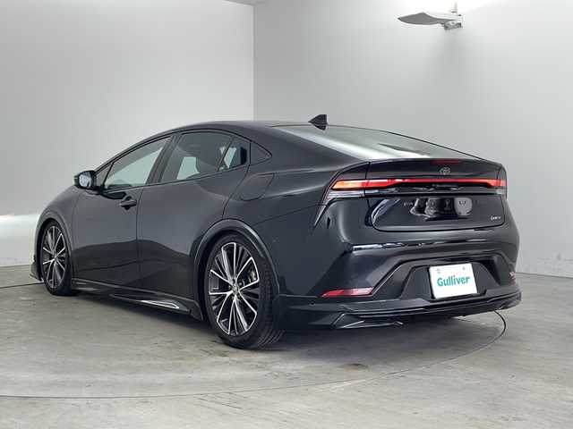 トヨタ プリウス Z 兵庫県 2023(令5)年 1.6万km アティチュードブラックマイカ ・純正ナビ（TV/USB/BT/MiraCast)/・パノラミックビューモニター/・ビルトインETC2.0/・モデリスタエアロ/・社外車高調/・トヨタセーフティセンス/・トヨタチームメイト/・アドバンスドパーク/・レーンディパーチャーアラート/・ブラインドスポットモニター/・プリクラッシュセーフティ/・プロアクティブドライビングアシスト/・後方車両接近告知/・パーキングサポートブレーキ/・安心降車アシスト/・周辺車両接近サポート/・ロードサインアシスト/・レーダークルーズコントロール/・レーンチェンジアシスト/・フロントクロストラフィックアラート/・オートマチックハイビーム/・クリアランスソナー/・パワーバックドア/・ワイヤレス充電/・レザーシート/・前席パワーシート/・前席シートヒーター/・前席エアシート/・ステアリングヒーター/・ドアミラーヒーター/・nanoeX/・AC１００V電源