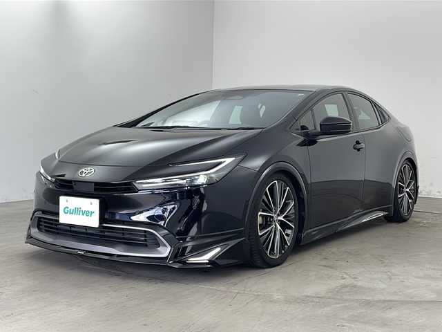 トヨタ プリウス Z 兵庫県 2023(令5)年 1.6万km アティチュードブラックマイカ ・純正ナビ（TV/USB/BT/MiraCast)/・パノラミックビューモニター/・ビルトインETC2.0/・モデリスタエアロ/・社外車高調/・トヨタセーフティセンス/・トヨタチームメイト/・アドバンスドパーク/・レーンディパーチャーアラート/・ブラインドスポットモニター/・プリクラッシュセーフティ/・プロアクティブドライビングアシスト/・後方車両接近告知/・パーキングサポートブレーキ/・安心降車アシスト/・周辺車両接近サポート/・ロードサインアシスト/・レーダークルーズコントロール/・レーンチェンジアシスト/・フロントクロストラフィックアラート/・オートマチックハイビーム/・クリアランスソナー/・パワーバックドア/・ワイヤレス充電/・レザーシート/・前席パワーシート/・前席シートヒーター/・前席エアシート/・ステアリングヒーター/・ドアミラーヒーター/・nanoeX/・AC１００V電源