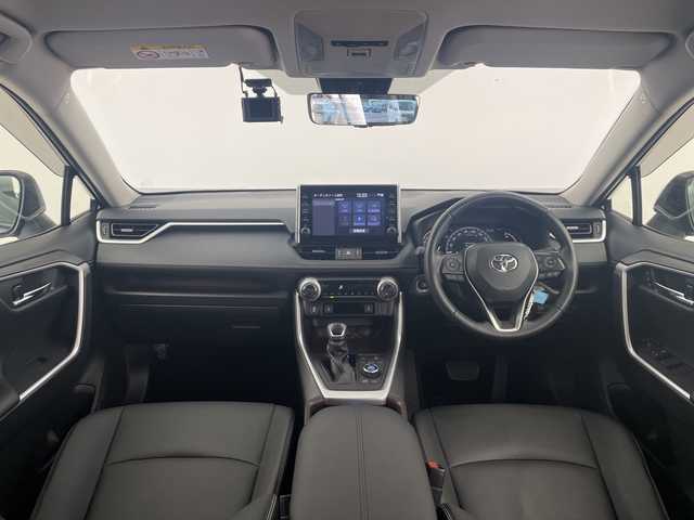 トヨタ ＲＡＶ４ G Zパッケージ 愛知県 2021(令3)年 3.8万km ダークブルーマイカ /純正9インチディスプレイオーディオ//パノラミックビューモニター//Bluetooth・USB・AM・FM・AppleCarPlay・AndroidAuto//ビルトインETC//デジタルインナーミラー//ハンズフリーパワーバックドア//合皮シート//運転席パワーシート//運転席助手席シートヒーター//純正フロアマット//トヨタセーフティセンス//プリクラッシュセーフティ//レーントレーシングアシスト//レーダークルーズコントロール//オートマチックハイビーム//ロードサインアシスト//先行車発進お知らせ//インテリジェントクリアランスソナー//パーキングサポートブレーキ//BSM//ダウンヒルアシストコントロール//ヒススタートアシストコントロール//MTモード付AT//LEDヘッドライト//オートライト//純正ドアバイザー//電動格納ミラー//革巻きステアリング//ステアリングヒーター//ステアリングスイッチ//プッシュスタート//スマートキー