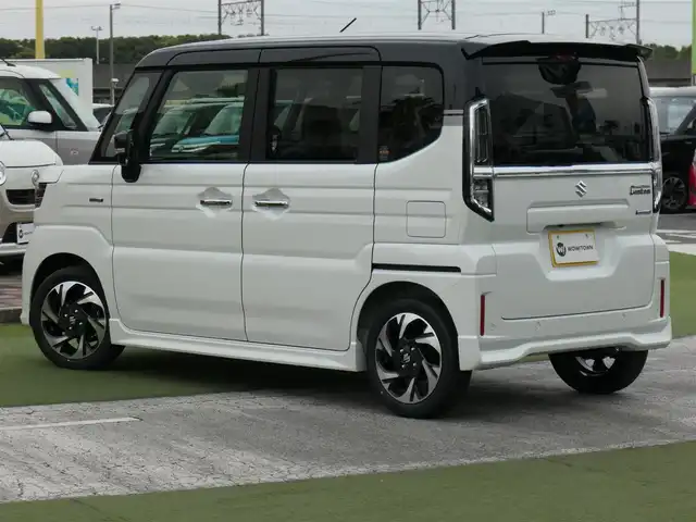スズキ スペーシア カスタム HYBRID XS 千葉県 2025(令7)年 0.1万km未満 ピュアホワイトパール/ブラック2トーン カスタム HV XS　全方位モニター付きメモリ-ナビゲーション・スズキコネクト対応通信機装着車(195800円)/スズキセーフティサポート/レーダークルーズコントロール/アイドリングストップ/ヘッドアップディスプレイ/両側パワースライドドア/純正メモリーナビ/地デジTV/【Bluetooth接続】/360°ビュー・モニター/ステアリングヒーター/ステアリングスイッチ/革巻きステアリング/ハーフレザーシート/前席シートヒーター/LEDヘッドライト/フォグライト/ウインカーミラー/コーナーセンサー/純正15インチアルミホイル/携帯リモコン