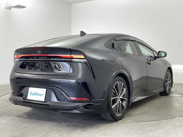 トヨタ プリウス Z 兵庫県 2023(令5)年 2.8万km アティチュードブラックマイカ ・純正12.3インチナビ＆BT＆TV＆Miracast/・モデリスタエアロ/・置くだけ充電/・トヨタセーフティセンス/・プリクラッシュセーフティセンス/・アラウンドビューモニター/・クリアランスソナー/・ブラインドスポットモニター/・レーンディパーチャーアラート/・プロアクティブドライビングアシスト/・オートマチックハイビーム/・デジタルインナーミラー/・ステアリングヒーター/・シートヒーター/・エアシート/・パワーシート/・シートメモリー/・パワーバックドア/・純正前後ドライブレコーダー/・電動パーキングブレーキ/・レザーシート/・純正19インチAW/・純正フロアマット/・ビルトインETC/・AC100V電源/・LEDライト/・革巻きステアリング