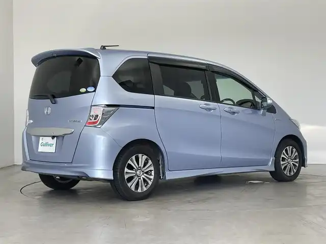ホンダ フリード ハイブリット ジャストセレクション 埼玉県 2011(平23)年 6.7万km プレミアムブルーオパールメタリック 社外ナビ　バックカメラ　両側パワースライドドア　クルーズコントロール　ＥＴＣ　オートライト　キセノンヘッドライト　ハーフレザーシート　スマートキー　純正１５インチアルミホイール　純正フロアマット