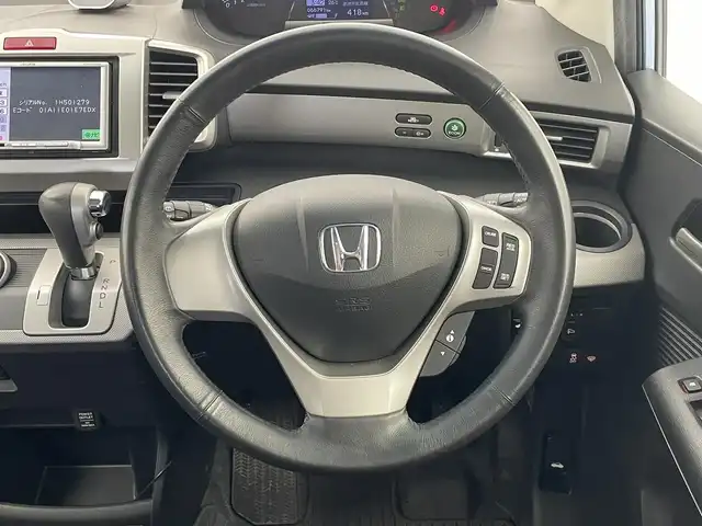 ホンダ フリード ハイブリット ジャストセレクション 埼玉県 2011(平23)年 6.7万km プレミアムブルーオパールメタリック 社外ナビ　バックカメラ　両側パワースライドドア　クルーズコントロール　ＥＴＣ　オートライト　キセノンヘッドライト　ハーフレザーシート　スマートキー　純正１５インチアルミホイール　純正フロアマット