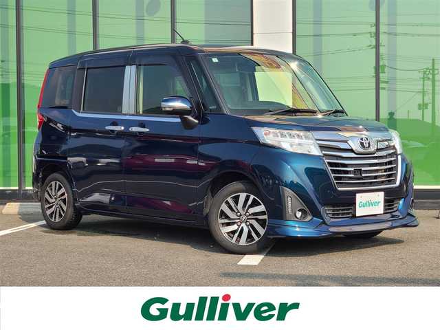 トヨタ ルーミー カスタムG S 福岡県 2017(平29)年 8.7万km ブラックマイカメタリック/レーザーブルークリスタルシャイン 2トーン メモリナビ/（AM/FM/CD/BT/フルセグTV）/クルーズコントロール/コーナーセンサー/バックカメラ/シートヒーター/両側パワースライドドア/衝突軽減システム/横滑り防止装置/２トンカラー/純正フロアマット/純正１４インチアルミホイール/純正LEDヘッドライト/アイドリングストップ/スマートキー/プッシュスタートボタン/ETC